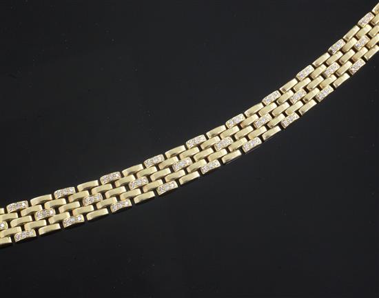 A Cartier 18ct gold and diamond set brick link bracelet, 18cm.